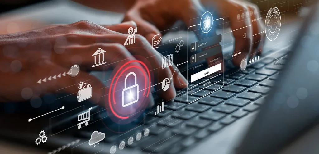 Zbliżenie na dłonie piszące na klawiaturze laptopa z nałożonymi grafikami symbolizującymi cyberbezpieczeństwo, w tym ikoną kłódki, logowania oraz elementami bankowości i danych cyfrowych.
